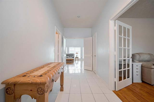 20011 Doherty Cir, Katy, TX 77449 - hall featuring baseboards and light tile patterned flooring