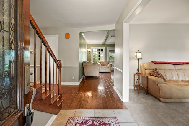 111 Whispering Oaks Dr, Seabrook, TX 77586 - foyer featuring baseboards, stairs, and wood-type flooring