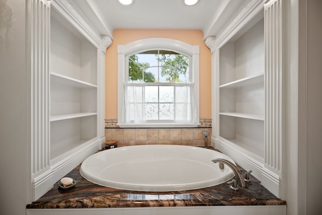 111 Whispering Oaks Dr, Seabrook, TX 77586 - bathroom featuring a garden tub and recessed lighting