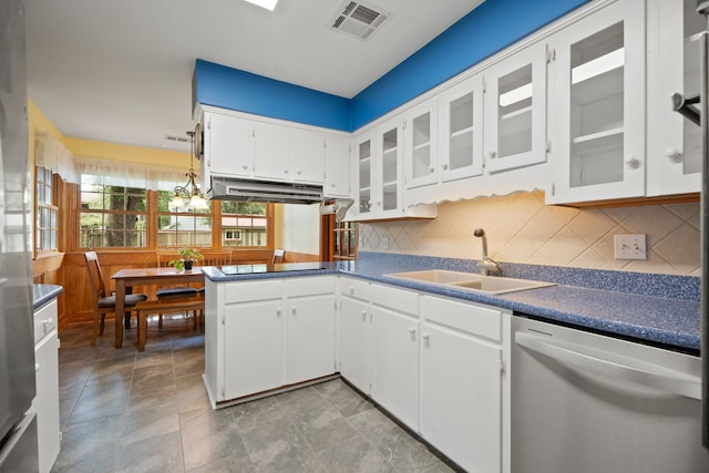111 Whispering Oaks Dr, Seabrook, TX 77586 - kitchen with dishwasher, a sink, under cabinet range hood, black electric stovetop, and white cabinetry