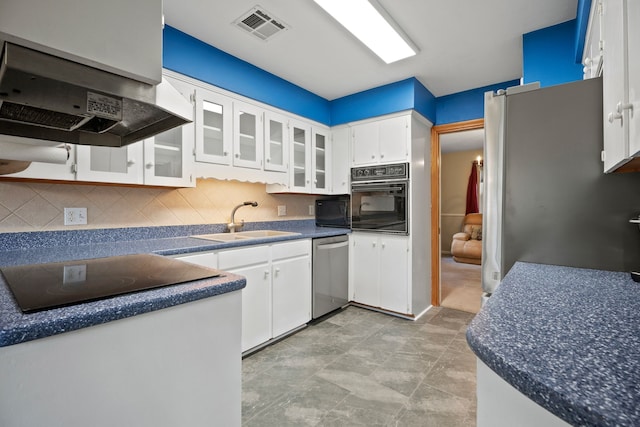 111 Whispering Oaks Dr, Seabrook, TX 77586 - kitchen with black appliances, a sink, extractor fan, white cabinets, and glass insert cabinets
