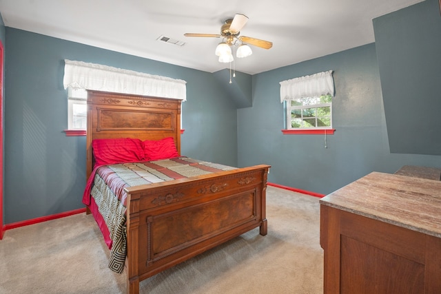 111 Whispering Oaks Dr, Seabrook, TX 77586 - bedroom with light colored carpet, baseboards, and ceiling fan