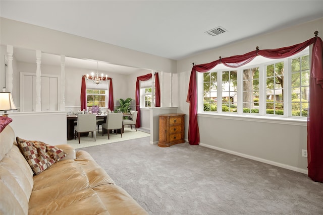 111 Whispering Oaks Dr, Seabrook, TX 77586 - living room featuring a chandelier, carpet floors, and baseboards