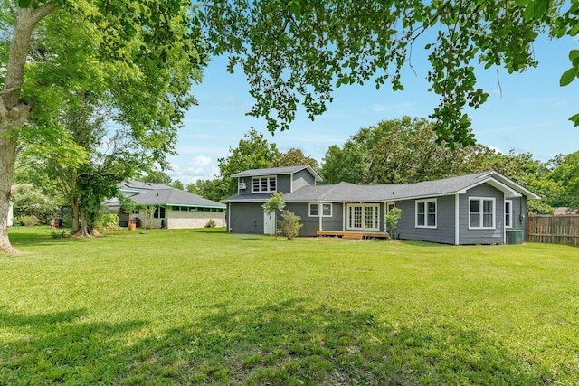 411 Southern Oaks Dr, Lake Jackson, TX 77566 - rear view of house featuring french doors and roof with shingles