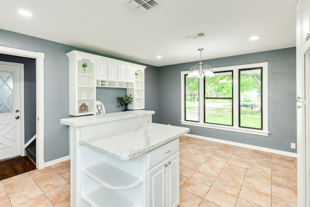 411 Southern Oaks Dr, Lake Jackson, TX 77566 - kitchen featuring open shelves, white cabinets, baseboards, and recessed lighting