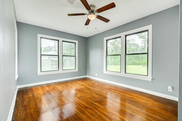 411 Southern Oaks Dr, Lake Jackson, TX 77566 - unfurnished room featuring baseboards, a ceiling fan, and wood finished floors