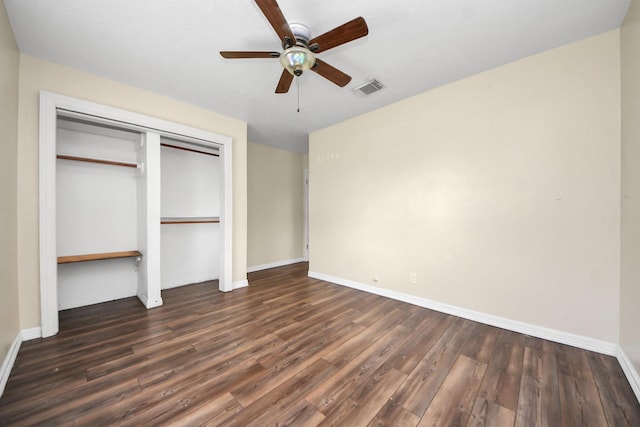141 E Twickenham Trl, Houston, TX 77076 - unfurnished bedroom featuring wood finished floors, baseboards, a closet, and a ceiling fan
