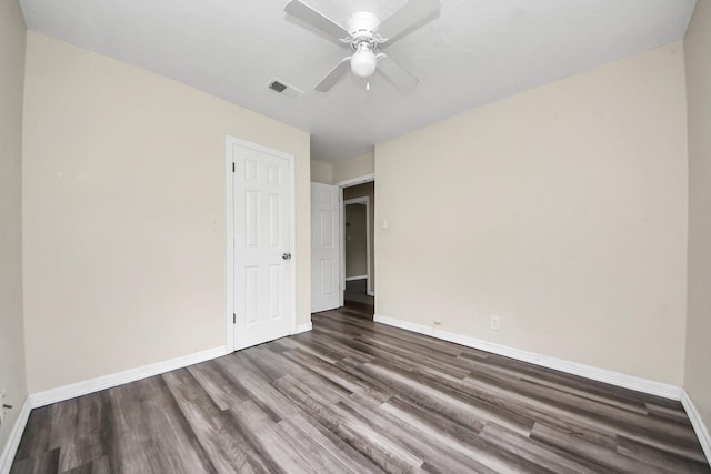 141 E Twickenham Trl, Houston, TX 77076 - empty room with wood finished floors, baseboards, and ceiling fan