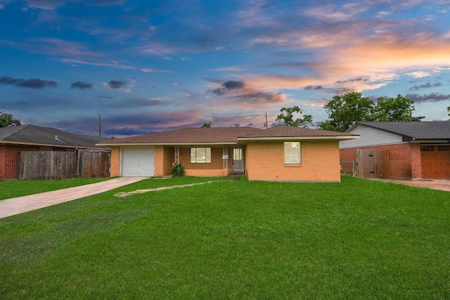 141 E Twickenham Trl, Houston, TX 77076 - ranch-style home featuring driveway, a garage, brick siding, and a gate