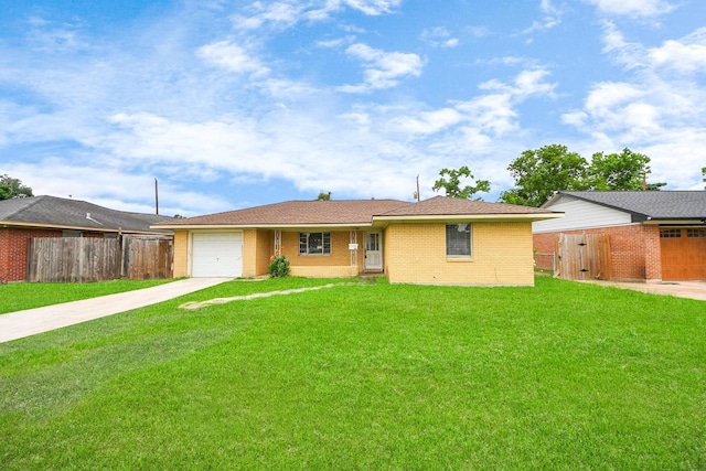 141 E Twickenham Trl, Houston, TX 77076 - single story home featuring concrete driveway, an attached garage, and brick siding
