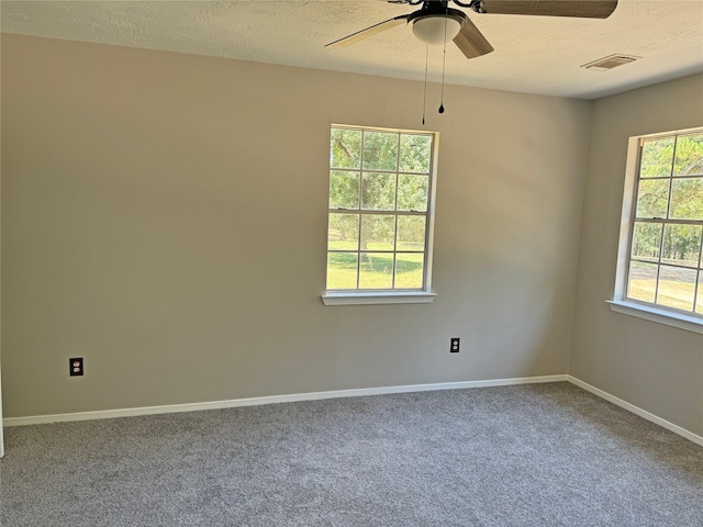 10 Walnut Loop, Shepherd, TX 77371 - carpeted empty room with a ceiling fan, a textured ceiling, and baseboards