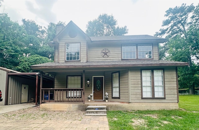 10 Walnut Loop, Shepherd, TX 77371 - view of front of property with covered porch and a chimney