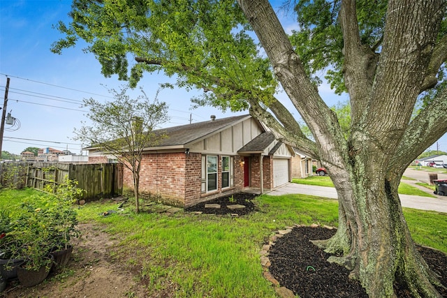 1043 Sierra Shadows Dr, Katy, TX 77450 - view of side of home with brick siding, an attached garage, driveway, a shingled roof, and board and batten siding