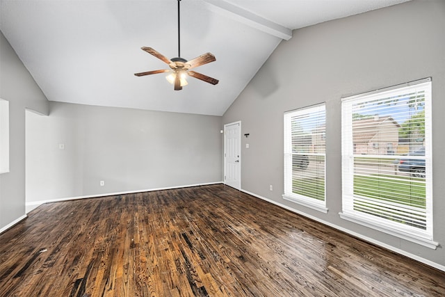 1043 Sierra Shadows Dr, Katy, TX 77450 - unfurnished living room featuring ceiling fan, wood finished floors, beam ceiling, baseboards, and high vaulted ceiling