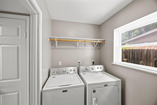 1043 Sierra Shadows Dr, Katy, TX 77450 - washroom featuring washer and clothes dryer
