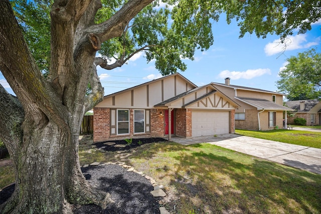 1043 Sierra Shadows Dr, Katy, TX 77450 - tudor home with brick siding, a garage, and concrete driveway