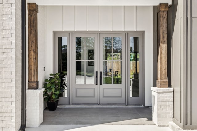 7310 Jalna St, Houston, TX 77055 - property entrance featuring french doors and board and batten siding