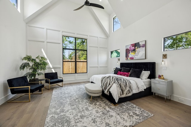 7310 Jalna St, Houston, TX 77055 - bedroom featuring high vaulted ceiling, wood finished floors, ceiling fan, and baseboards