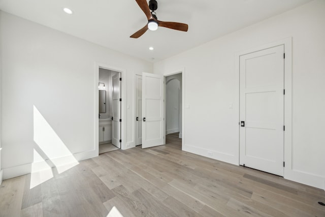 7310 Jalna St, Houston, TX 77055 - unfurnished bedroom featuring light wood-style flooring, recessed lighting, connected bathroom, baseboards, and a ceiling fan