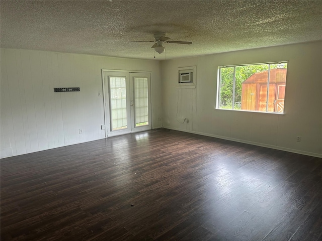 3118 Dacca Dr, Houston, TX 77051 - empty room featuring a ceiling fan, dark wood-style floors, and a textured ceiling