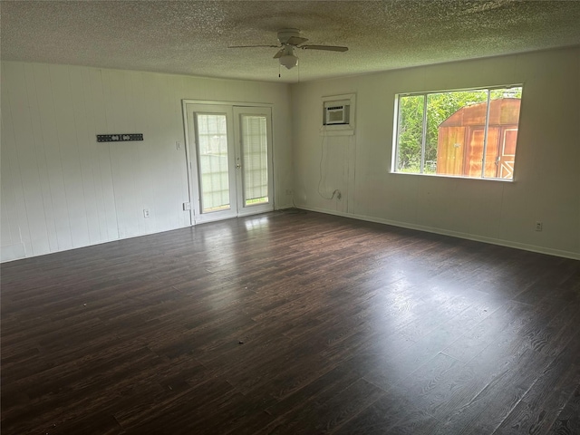 3118 Dacca Dr, Houston, TX 77051 - unfurnished room with ceiling fan, dark wood-style flooring, and a textured ceiling