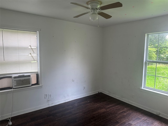 3118 Dacca Dr, Houston, TX 77051 - spare room featuring dark wood-style floors, healthy amount of natural light, and baseboards