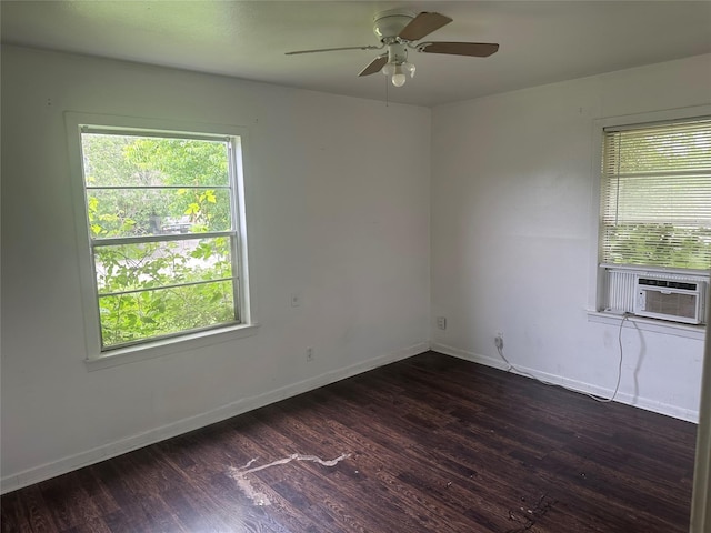 3118 Dacca Dr, Houston, TX 77051 - spare room featuring cooling unit, a ceiling fan, healthy amount of natural light, and dark wood finished floors