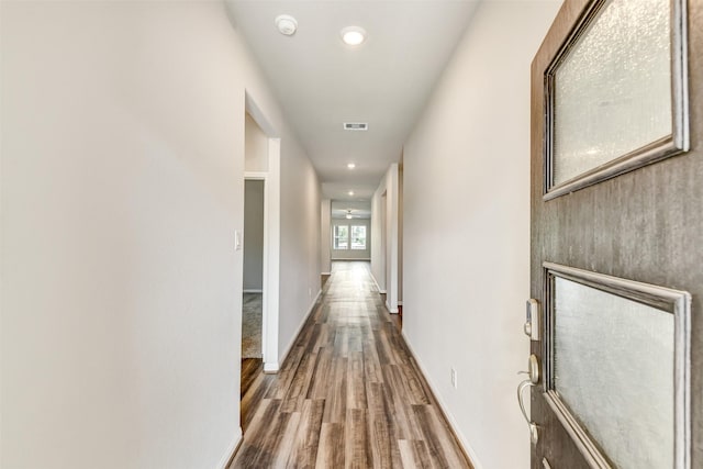 1210 Oak Barrel Run, Richmond, TX 77406 - hall with wood finished floors, recessed lighting, and baseboards
