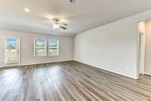 1210 Oak Barrel Run, Richmond, TX 77406 - empty room featuring a ceiling fan, wood finished floors, and baseboards