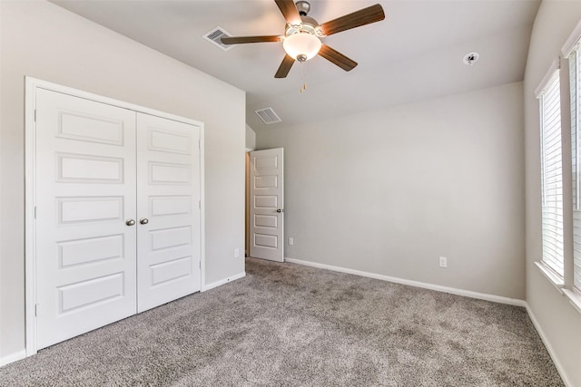 1210 Oak Barrel Run, Richmond, TX 77406 - unfurnished bedroom with carpet, a closet, baseboards, a ceiling fan, and vaulted ceiling