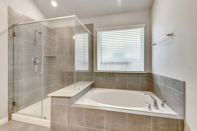 1210 Oak Barrel Run, Richmond, TX 77406 - full bathroom with a bath, a shower stall, and tile patterned floors