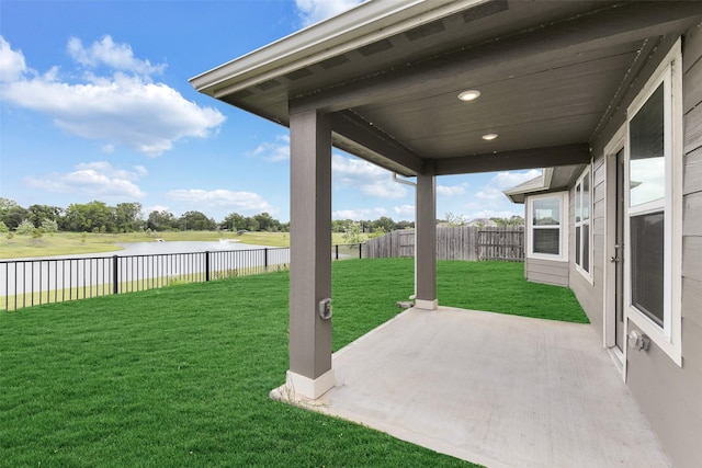 1210 Oak Barrel Run, Richmond, TX 77406 - view of yard featuring a water view and a patio