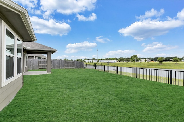 1210 Oak Barrel Run, Richmond, TX 77406 - view of yard featuring a water view