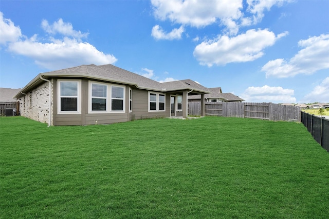 1210 Oak Barrel Run, Richmond, TX 77406 - rear view of house featuring central AC unit