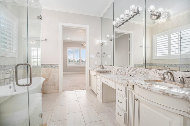 11503 Kings Point Blvd, Mont Belvieu, TX 77535 - bathroom featuring double vanity, ornamental molding, a freestanding bath, tile patterned floors, and a shower with door