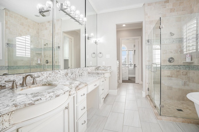 11503 Kings Point Blvd, Mont Belvieu, TX 77535 - full bath featuring crown molding, double vanity, a shower stall, and baseboards