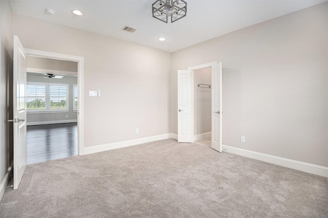 11503 Kings Point Blvd, Mont Belvieu, TX 77535 - unfurnished room with carpet flooring, baseboards, recessed lighting, and a smoke detector