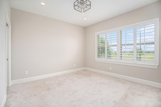 11503 Kings Point Blvd, Mont Belvieu, TX 77535 - carpeted empty room with baseboards and recessed lighting