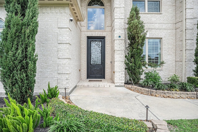 11503 Kings Point Blvd, Mont Belvieu, TX 77535 - doorway to property featuring a surveillance system