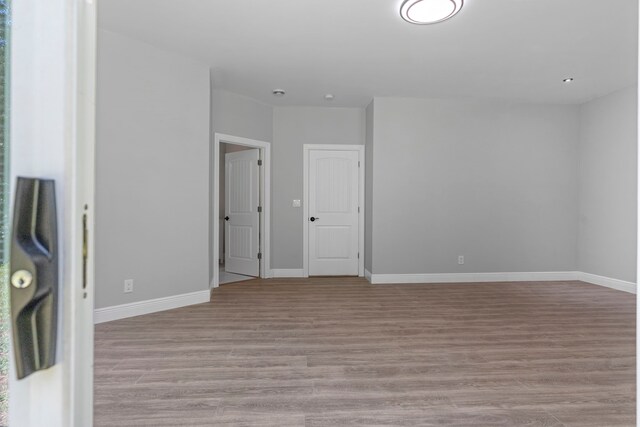 17501 Julianne Dr, Waller, TX 77484 - spare room with light wood-style floors and baseboards