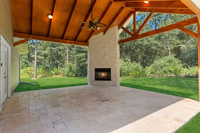 17501 Julianne Dr, Waller, TX 77484 - view of patio / terrace with an outdoor stone fireplace and ceiling fan