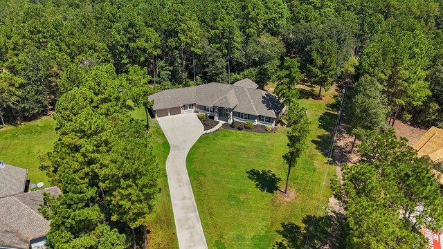 17501 Julianne Dr, Waller, TX 77484 - view from above of property featuring a forest