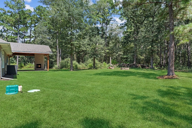 17501 Julianne Dr, Waller, TX 77484 - view of green lawn featuring cooling unit