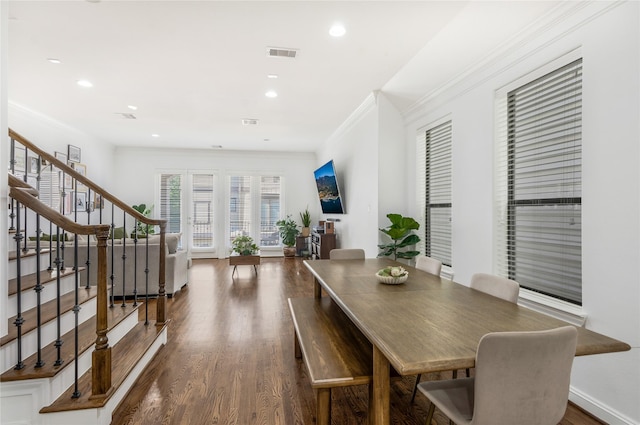 8817 Lakeshore Bend Dr, Houston, TX 77080 - dining space with stairway, crown molding, dark wood-type flooring, and recessed lighting