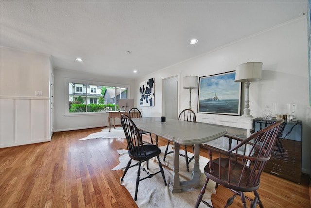 1635 Althea Dr, Houston, TX 77018 - dining area featuring wood finished floors, crown molding, and recessed lighting