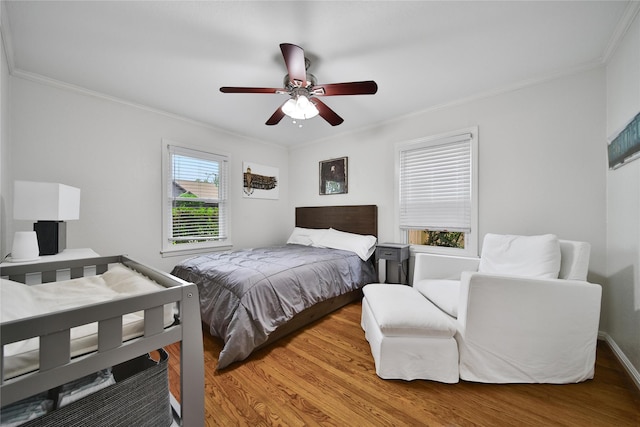 1635 Althea Dr, Houston, TX 77018 - bedroom featuring light wood-style floors, crown molding, and ceiling fan