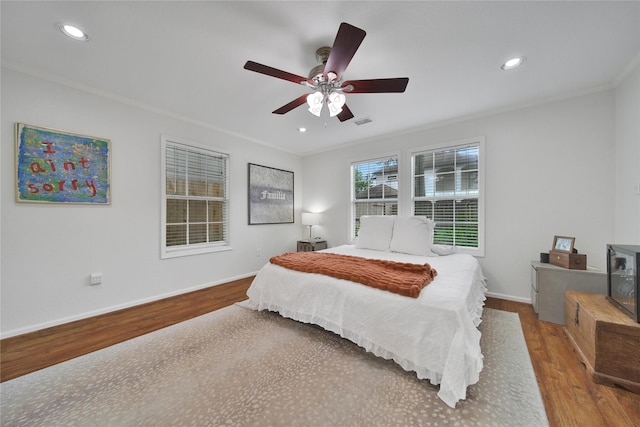 1635 Althea Dr, Houston, TX 77018 - bedroom featuring wood finished floors, crown molding, baseboards, recessed lighting, and ceiling fan