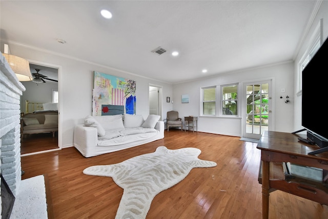 1635 Althea Dr, Houston, TX 77018 - living area featuring crown molding, wood finished floors, recessed lighting, and baseboards