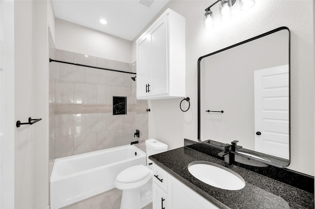 8714 Clarington St, Houston, TX 77016 - full bathroom featuring toilet, vanity, shower / bath combination, and tile patterned floors