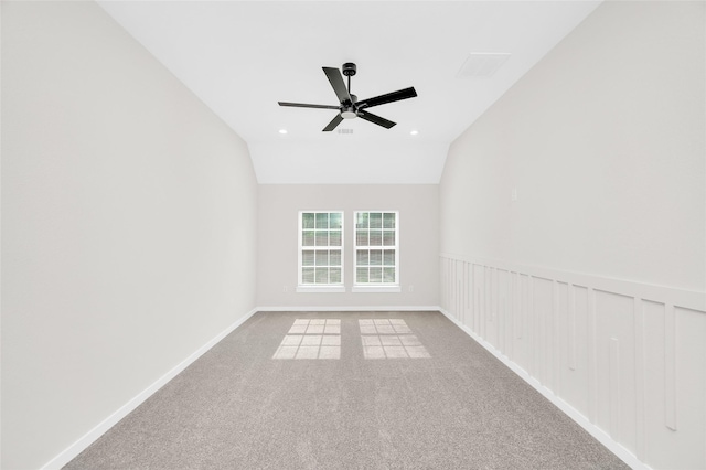 8714 Clarington St, Houston, TX 77016 - spare room featuring a ceiling fan, carpet flooring, lofted ceiling, baseboards, and recessed lighting